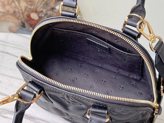Alice Bags- Louis Vuittons - 16618