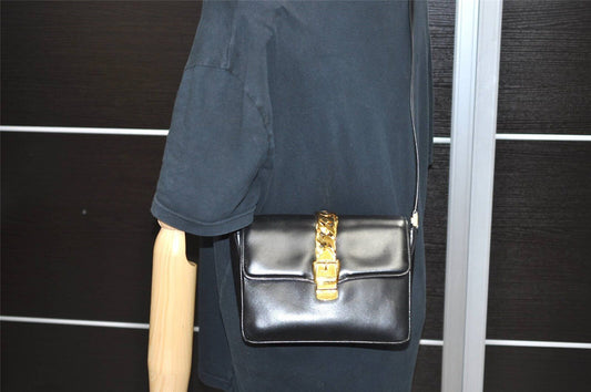 Gucci 1969 Sylvie navy leather shoulder bag with a gold zipper accent