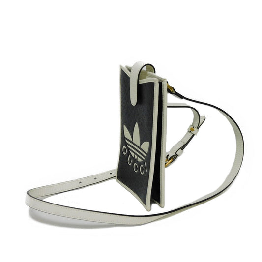 GUCCI 702203 UZ3BT 1057 Textured leather black Adidas Phone Cases