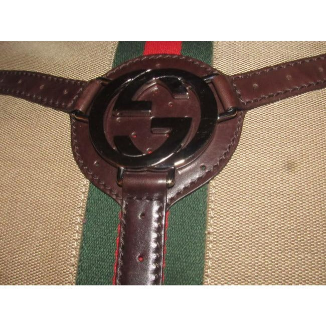 Gucci britt reins blondie, dark khaki canvas & brown leather, two handle, two-way- satchel or hobo style purse with an open top, red and green Sherry stripe and chrome GG accent