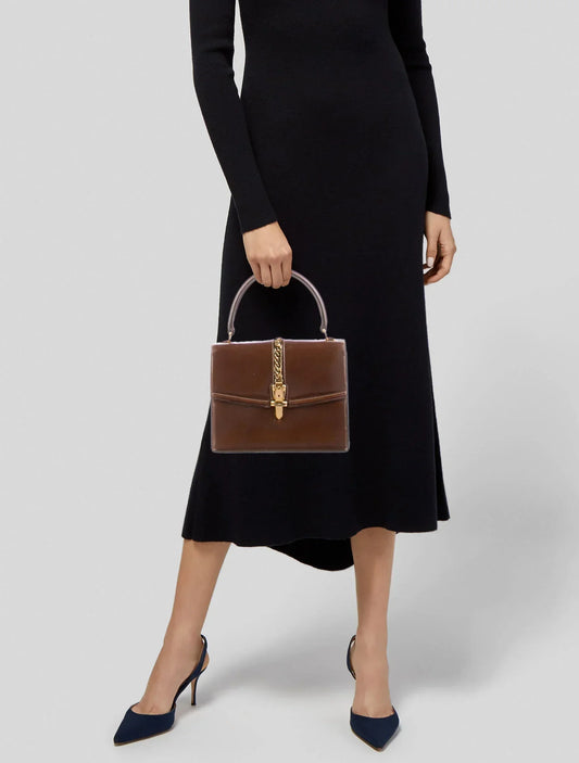 Gucci 1969 Sylvie chestnut brown leather top handle Kelly bag with a gold zipper accent
