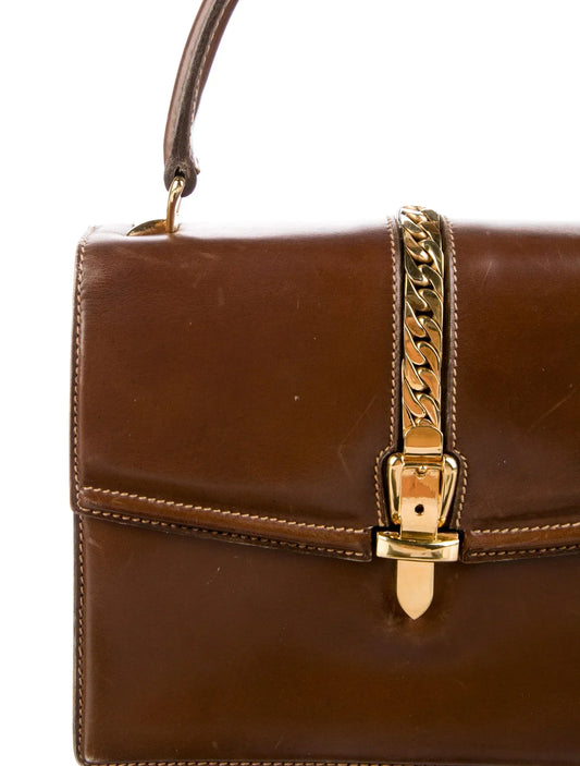 Gucci 1969 Sylvie chestnut brown leather top handle Kelly bag with a gold zipper accent