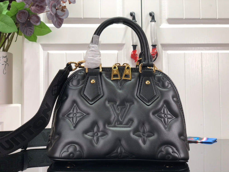 Alice Bags- Louis Vuittons  - 16731