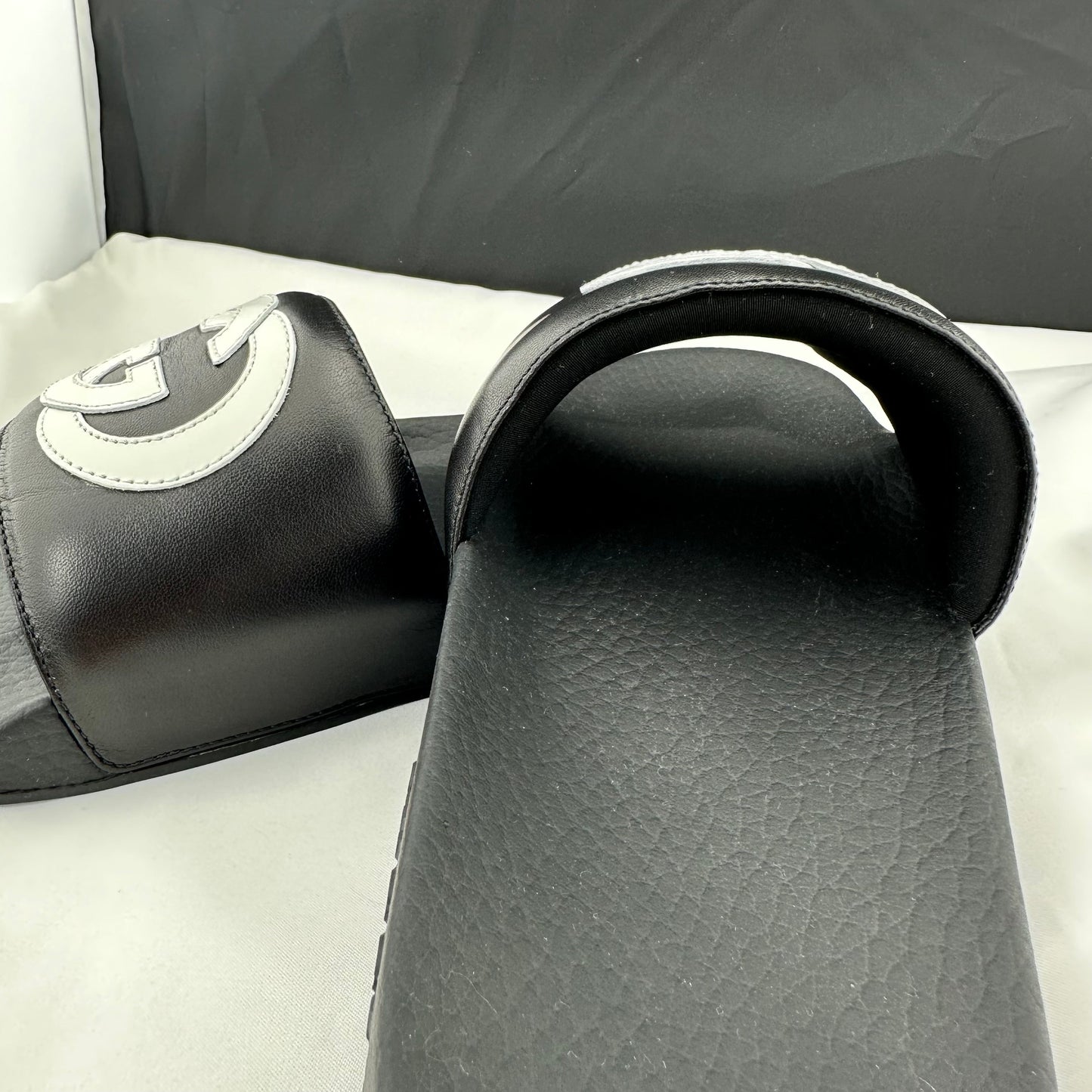 Gucci Men's Black Slides with White Interlocking GG